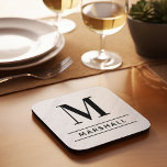 Classic Black Personalized Family Monogram Initial Beverage Coaster<br><div class="desc">Classic and modern personalized beverage drink coaster design features an masculine yet elegant custom serif monogram initial along with your family's last name accented with simple horizontal stripes against a white marble patterned background. Black text and design colors can be modified to perfectly coordinate with your home decor.</div>