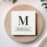 Classic Black Personalized Family Monogram Initial Stone Coaster<br><div class="desc">Classic and modern personalized beverage drink coaster design features an masculine yet elegant custom serif monogram initial along with your family's last name accented with simple horizontal stripes against a white marble patterned background. Black text and design colors can be modified to perfectly coordinate with your home decor.</div>