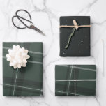 Classic bold holiday plaid and stars hunter green wrapping paper sheets<br><div class="desc">A bold modern take on a classic holiday plaid makes this wrapping paper set perfect way for both traditional and unconventional gift givers. The hunter green background with the tilted black and white checks is chic and stylish. Also includes a coordinating sheet dotted with stars. Will look fantastic on all...</div>