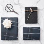 Classic bold navy blue plaid and stars wrapping paper sheets<br><div class="desc">A bold modern take on a classic holiday plaid makes this wrapping paper set perfect way for both traditional and unconventional gift givers. The navy background with the tilted black and white checks is chic and stylish. Will look fantastic on all your gifts under the tree perfectly coordinated with your...</div>
