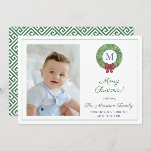 Classic Boxwood Wreath Red Green Merry Christmas Holiday Card - An upscale Happy Holidays photocard with space for a single letter monogram and a family photo. The watercolor elements were originally handpainted by me in watercolors onto 100% cotton paper before being scanned and arranged / styled digitally. Please note you can change the contrast color on the back (currently a forest green) and all the colors on the front (except the wreath ./ bow). To do this you will need to enter the design tool (click / tap to "personalize further).