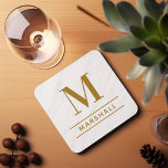 Classic Brass Personalized Family Monogram Initial Beverage Coaster<br><div class="desc">Classic and modern personalized beverage drink coaster design features an elegant custom serif monogram initial along with your family's last name accented with simple horizontal stripes against a white marble patterned background. Antique gold / brass text and design colors can be modified to perfectly coordinate with your home decor.</div>