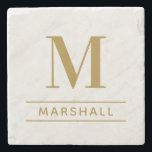 Classic Brass Personalized Family Monogram Initial Stone Coaster<br><div class="desc">Classic and modern personalized beverage drink coaster design features an elegant custom serif monogram initial along with your family's last name accented with simple horizontal stripes against a white marble patterned background. Antique gold / brass text and design colors can be modified to perfectly coordinate with your home decor.</div>
