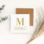 Classic Brass Personalized Family Monogram Initial Stone Coaster<br><div class="desc">Classic and modern personalized beverage drink coaster design features an elegant custom serif monogram initial along with your family's last name accented with simple horizontal stripes against a white marble patterned background. Antique gold / brass text and design colors can be modified to perfectly coordinate with your home decor.</div>
