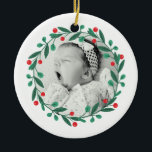 Classic Christmas Wreath Babys 1st Christmas Ceramic Ornament<br><div class="desc">Add a touch of festive charm to your holiday décor with our beautifully crafted Christmas ornament, perfect for hanging on your tree or gifting to loved ones. This high-quality ornament features a customizable design, allowing you to personalize it with names, dates, or a special message, making it a treasured keepsake...</div>
