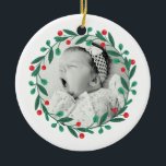 Classic Christmas Wreath Babys 1st Christmas Ceramic Ornament<br><div class="desc">Add a touch of festive charm to your holiday décor with our beautifully crafted Christmas ornament, perfect for hanging on your tree or gifting to loved ones. This high-quality ornament features a customizable design, allowing you to personalize it with names, dates, or a special message, making it a treasured keepsake...</div>
