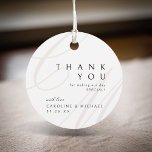 Classic Elegance Script monogram wedding favor Favor Tags<br><div class="desc">Modern classic minimalist thank you wedding favor tags feature elegant calligraphy couple monogram and timeless serif font event details in color editable beige,  black and white,  simple and sophisticated,  Great for formal vintage wedding,  romantic traditional wedding,  modern classic wedding in all seasons. 
See all the matching pieces in collection.</div>