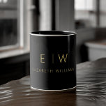 Classic Elegant Black Gold Minimalist Monogram Two-Tone Coffee Mug<br><div class="desc">Elevate your morning routine with our Black and Gold Modern Minimalist Monogram Name Coffee Mug. This sleek and stylish mug brings a touch of contemporary elegance to your daily coffee ritual. Crafted with quality in mind, it features a minimalist design in classic black and white, making it a versatile addition...</div>