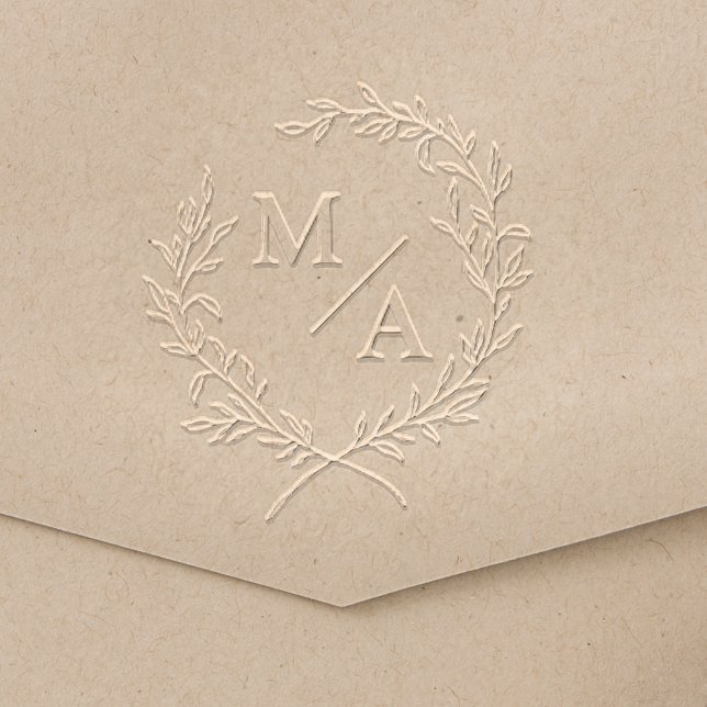 Classic Elegant Monogram and Laurel Wreath Embosser (An open laurel wreath with the bride and groom's monogram initials add elegance to your invitations.)