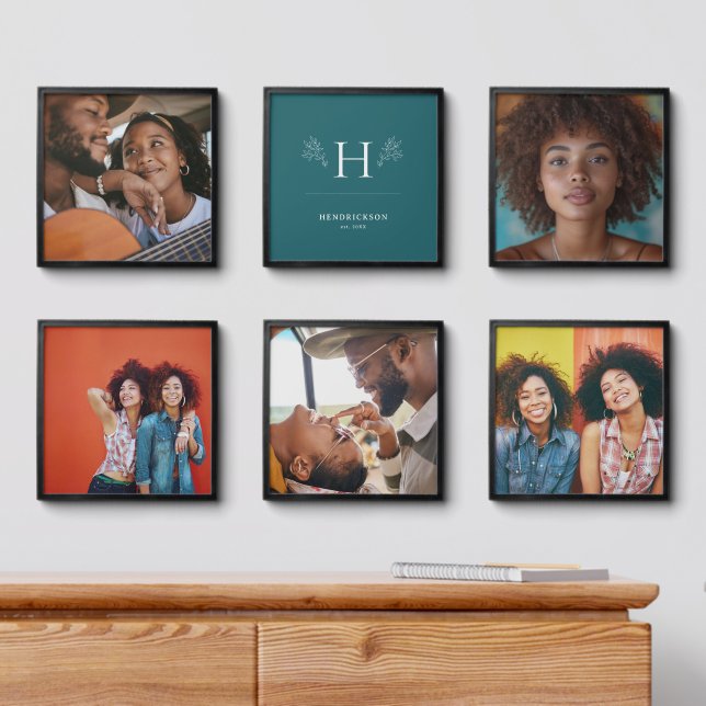 Six framed peel-and-stick photo tiles on a wall with a cupboard underneath that has one book on it.