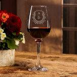 Classic Floral Crest Monogram Wedding Elegant Wine Glass<br><div class="desc">Elevate your wedding with a classic floral crest monogram wine glass, perfect for adding elegance to your celebration. Featuring a timeless floral crest and personalized monogram, this beautifully crafted glass adds a refined, sophisticated touch to your reception or bridal party. Ideal for toasts and special moments, it serves as both...</div>