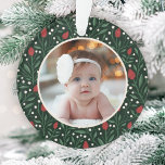 Classic Floral Frame Baby's First Christmas Ornament<br><div class="desc">This beautiful Baby's First Christmas holiday photo ornament features a hand drawn floral and greenery pattern in classic, traditional Christmas colors of red, green, and ivory over a dark green background. A small ivory colored frame allows your photo to stand out against the background. The back contains text templates for...</div>