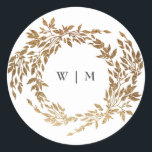 Classic Gold Monogram Botanical Crest Wedding Classic Round Sticker<br><div class="desc">*NOT REAL FOIL _____________________________ ***this design is part of a collection*** Experience the charm of timeless elegance with my formal Traditional Monogram Wreath Classic and Elegant Wedding Collection. This collection features personalized monogrammed designs with an intricately woven wreath and frame, encapsulating the essence of a classic, memorable wedding. Enjoy the...</div>