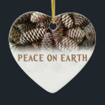 Classic Holiday Pine Cone Peace On Earth Ceramic Ornament<br><div class="desc">Festive,  earthy pine cones set off this classic,  elegant design wishing Peace On Earth.</div>