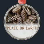 Classic Holiday Pine Cone Peace On Earth Metal Ornament<br><div class="desc">Festive,  earthy pine cones set off this classic,  elegant design wishing Peace On Earth.</div>