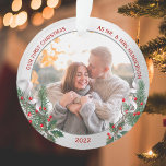 Classic Holly Pine Silver Frame Photo Newlyweds  Ornament<br><div class="desc">Classic Holly Pine Silver Frame Photo Newlyweds 1st Christmas ornament has a shiny silver frame adorned with holly, pine & ribbon ornament to display your own special memory. The bright and shiny silver border encircles your memorial photos. The holly, pine and silk ribbon complete the whole design with a joyful...</div>
