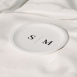 Classic Ivory Monogram Wedding Paper Plates<br><div class="desc">Enhance your wedding decor with these custom paper plates, featuring the couple’s monogram beautifully centered in an elegant serif font. The earthy beige ivory tone adds a refined, natural touch, making these plates ideal for both elegant and rustic-themed weddings. Perfect for cocktail hours, receptions, or casual wedding celebrations, these personalized...</div>