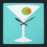 Classic Movie Martini Wall Clock<br><div class="desc">This Classic Movie Martini Wall Clock features a turquoise background and the white silhouette of a martini glass. Inside the glass is a glorious green olive with an orange pimento. This is a fun wall clock for everyone who wishes they were a character in a classic movie. Shaken not stirred,...</div>