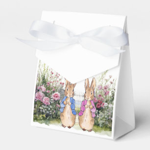 Classic rabbits in their flower garden favor boxes
