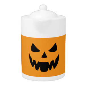 Classic, spooky pumpkin face teapot