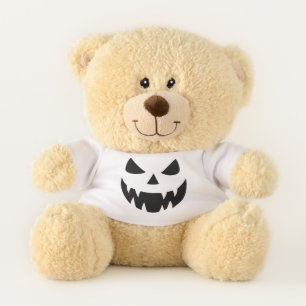 Classic, spooky pumpkin face teddy bear