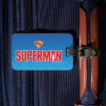 Classic Superman Bold Logo Luggage Tag<br><div class="desc">Bring timeless superhero energy to your style with this striking Superman design! Featuring the bold red “SUPERMAN” text with a silhouette of the Man of Steel heroically posed within the lettering, this artwork pops against a sleek gradient blue background. Topped with the iconic red and yellow “S” shield, it’s a...</div>