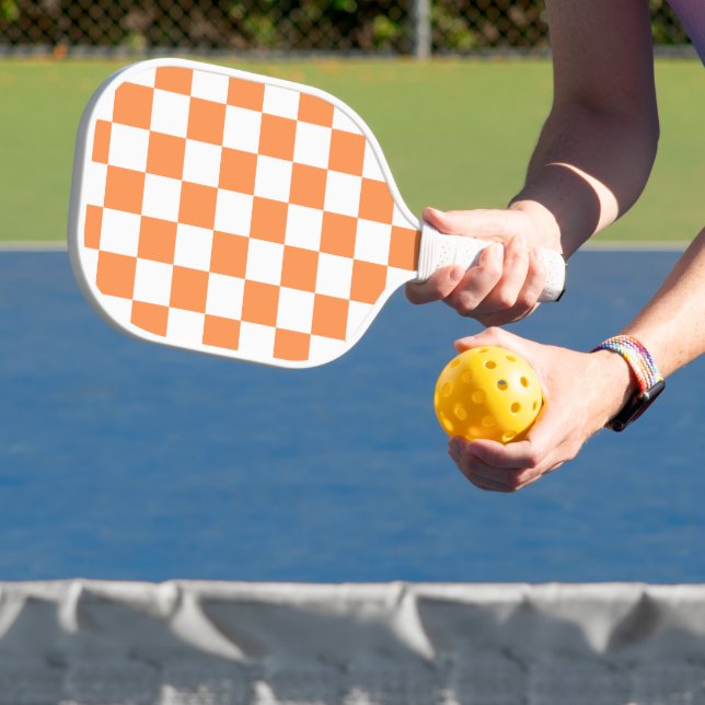 Classic visual orange checkerboard  pickleball paddle (Insitu)