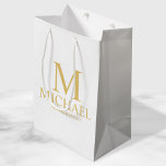 Classic White and Gold Personalized Groomsman Medium Gift Bag<br><div class="desc">Classic White and Gold Personalized Groomsman Gifts featuring personalized monogram, groomsman's name and title in gold classic serif font style. Also perfect for Best Man, Father of the Bride and more. Please Note: The foil details are simulated in the artwork. No actual foil will be used in the making of...</div>