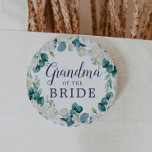 Classic White Flowers Grandma of the Bride Button<br><div class="desc">This classic white flowers grandma of the bride button is perfect for a spring wedding shower. The elegant floral design features soft ivory and white roses,  peonies,  and chrysanthemum with touches of periwinkle blue watercolor flowers and green foliage.</div>