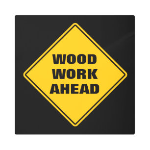 Classic yellow wood work ahead caution road sign