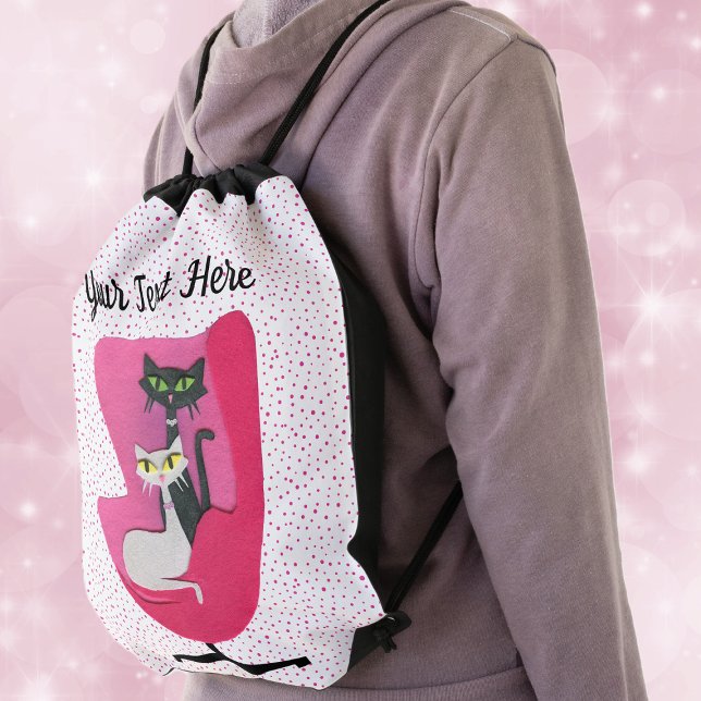Classy black White Atomic Cats Pink Chair Dots Drawstring Bag (Classy cats in diamond collars in vintage pink chair on white with pink dots drawstring backpack.)
