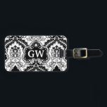 Classy Masculine Black White Damask Monogram Luggage Tag<br><div class="desc">This is a vintage, Victorian era, black and white damask luggage tag design with a space for your monogram. It's an elegant, pretty pattern that you can personalize / customize with your initials. For those who love a stylish, antique, monogrammed look. Don't forget to add your name and address to...</div>