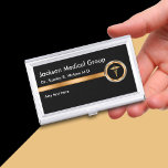 Classy Medical Business Card Cases<br><div class="desc">Classy medical business card case in a gold and black professional design including a medical caduceus symbol that presents your medical practice,  medical profession,  or service in a professional manner. Newly designed for a doctor,  medical business or home health nurse.</div>