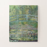 Claude Monet Japanese Bridge Water Lily Art Jigsaw Puzzle<br><div class="desc">"The Water-Lily Pond" (1899) is one of the most beloved masterpieces by Claude Monet, the pioneer of French Impressionism. This iconic painting depicts the serene beauty of his private garden in Giverny. A gracefully arched Japanese wooden bridge spans a tranquil pond covered in blooming water lilies. Monet masterfully uses a...</div>