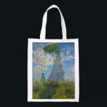 Claude Monet Woman with a Parasol Grocery Bag<br><div class="desc">Shop with Impressionist elegance. This reusable grocery bag features Claude Monet’s Woman with a Parasol, alive with airy blues, fresh greens, and soft whites. The graceful mother-and-child scene, painted in Monet’s luminous brushstrokes, brings timeless beauty to your everyday errands. Durable and lightweight, the bag is perfect for groceries, farmer’s markets,...</div>