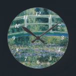 Claude Monet's Water Lilies and Japanese Bridge Round Clock<br><div class="desc">1899. Claude Monet (14 November 1840 – 5 December 1926) was a founder of French impressionist painting,  and the most consistent and prolific practitioner of the movement's philosophy of expressing one's perceptions before nature,  especially as applied to plein-air (painting outdoors) landscape painting.</div>