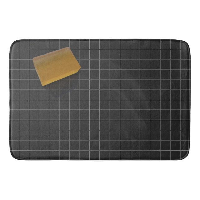 Clear Orange Soap on a Black Tile Floor Bathroom Mat (Front)