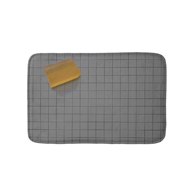 Clear Orange Soap on a Gray Tile Floor Bathroom Mat (Front)
