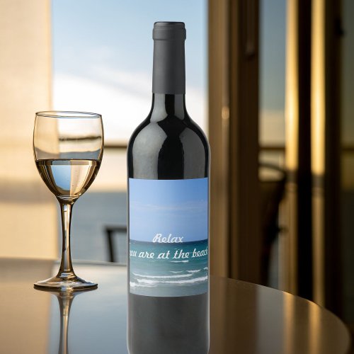 Clear turquoise beach bottle label