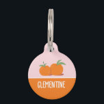 Clementine Pet ID Tag<br><div class="desc">Adorn your sweet pet with our 'Clementine' Pet ID Tag, the perfect blend of charm and practicality. This tag features a delightful duo of clementines or satsumas that capture the essence of a sunny citrus orchard, set against a pastel pink backdrop for a pop of color. Below, the sample name...</div>