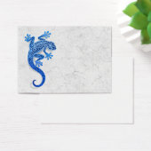 Climbing Blue Gecko on a White Wall (Desk)