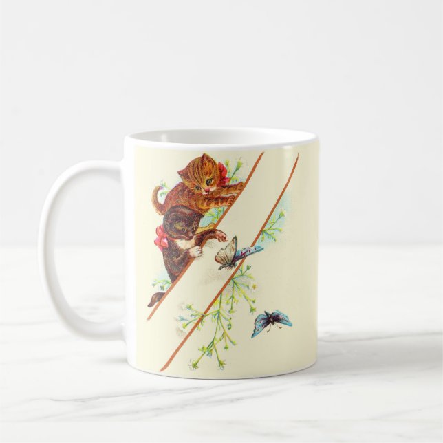 climbing kittens and butterflies coffee mug (Left)