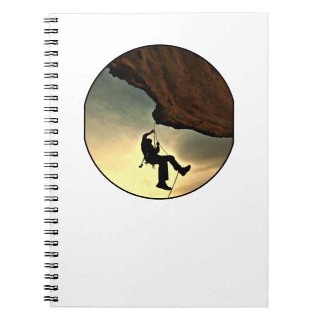 Climbing mountain man at sunset notebook (Front)