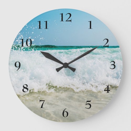 Clock with a beach scene crashing waves