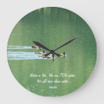 Clock with ducks swimming in a lake