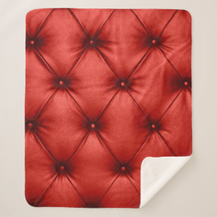 Close up background texture of scarlet red capiton sherpa blanket