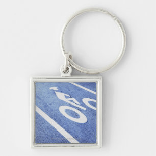 Close-up of a bicycle sign on the road keychain