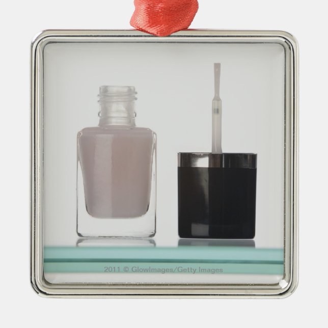 Close-up of a bottle of nail polish metal ornament (Front)