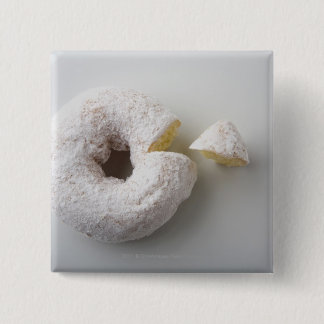 Close-up of a cake pinback button