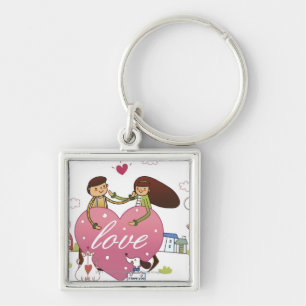 Close-up of a couple holding a heart shape keychain
